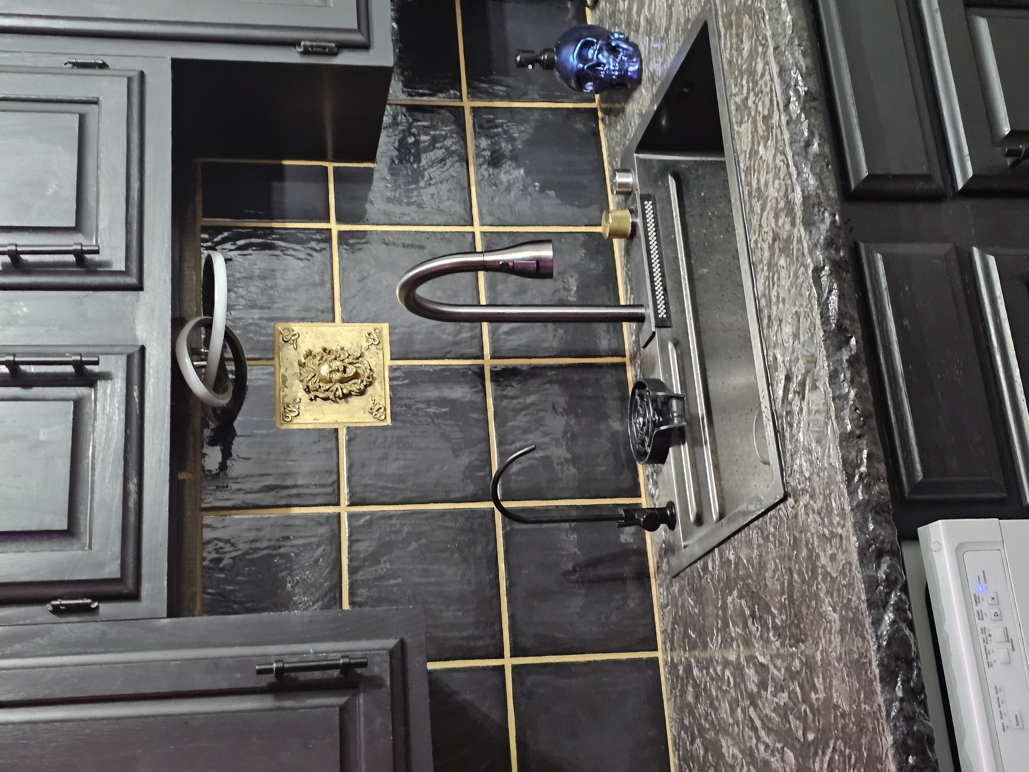 Medusa concrete counter and backsplash installation